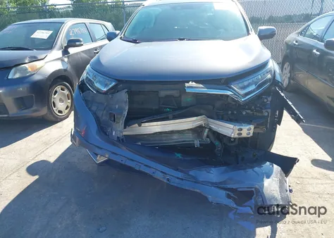 2021 Honda Cr-V Awd Touring z USA, uszkodzony, nr VIN 5J6RW2H9XML014474